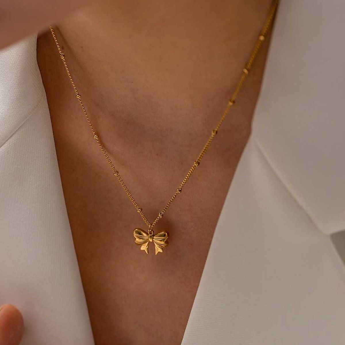 Gold Bow Pendant Necklace