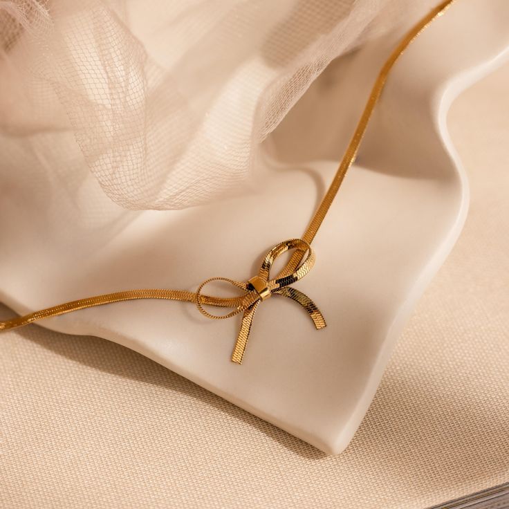 Gold Ribbon Bow Pendant Necklace