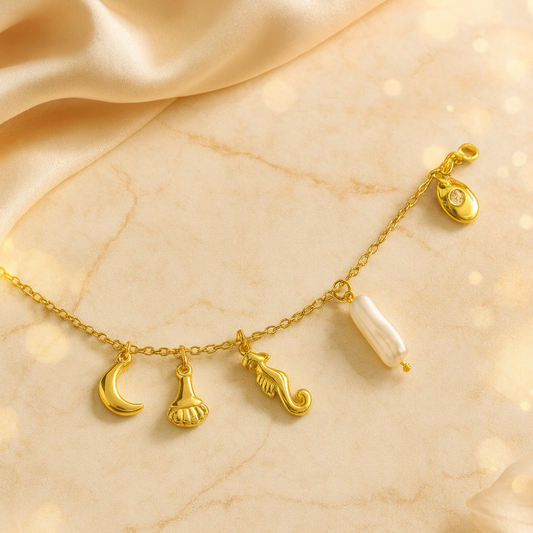 Gold charm bracelet