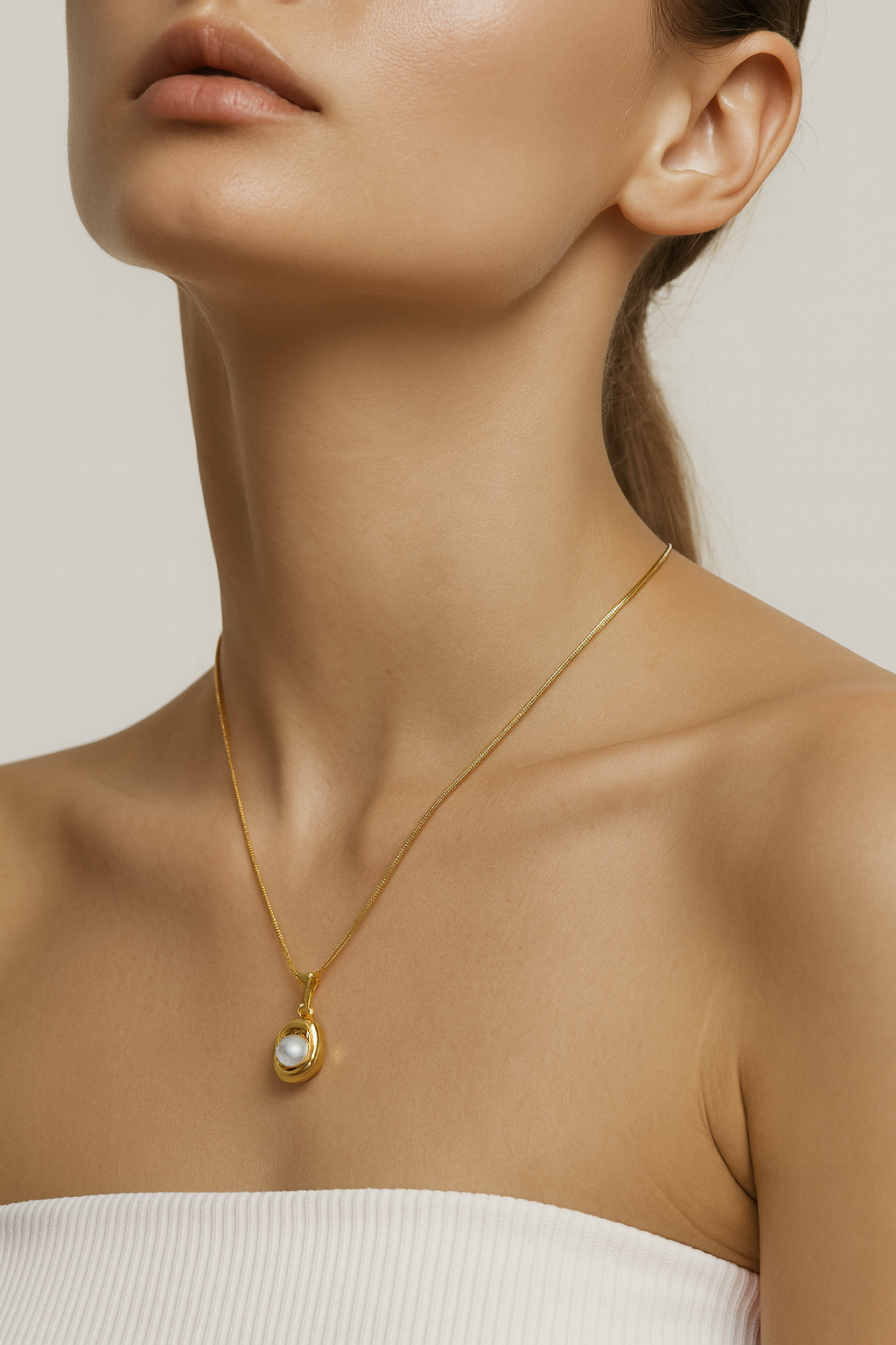 Radiant Glow Gold & Pearl Pendant