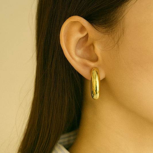 Sleek Gold Oval Stud Earrings
