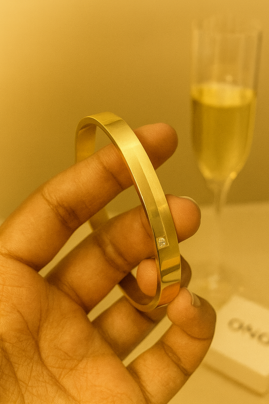 Elegant Gold Bangle with Diamond Accent